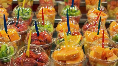 Coolers - fruit cocktails for sale in a market in Barcelona, Spain.