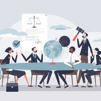 Illustration of six people at a conference table with a globe, legal document, and gavel, symbolizing corporate governance discussion.